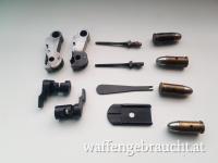 Teile P08 , FN Hp 35, Kompen-vermutlich 308 unbekannt, S&W Schlüssel( Tausch Walther PPK Magazine möglich u Karton Evt