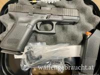 Glock 19 Gen5 FS im Kaliber 9x19mm mit Transportkoffer, zweitem Magazin und verschiedene Griffballen