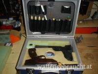 Luftdruckpistolen im Koffer
