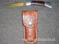Klappmesser Marke Herbertz mit Goldklinge und Ledertasche