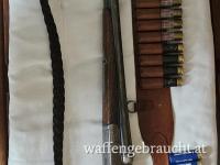 Suhler Doppelflinte Kal. 16/70, Patronengurt, 31 Stk. Munition. Lederriemen. 2 Pufferpatronen. Tel. 0650/4283636