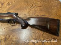 Steyr Luxus L (243 308 22-250 5,6x50  5,6x57) handgeschnitzter Schaft Kaisergriff, Krawatte, Fischhaut und Schaftverschneidungen