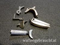 Gesuchte Ersatzteile für Griffstück einer Colt M 1911 Gov.  oder Clone........