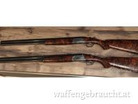 Rizzini Flintenpärchen 12/76 710m Lauflänge mit Wechselchocks und Doppellederfutteral 