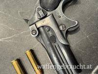 Derringer Cal. 38 + Holster + 2 Patronen