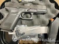Glock 19 Gen5 FS im Kaliber 9x19mm mit Transportkoffer, zweitem Magazin und verschiedene Griffballen
