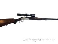 gebr. HAUPTMANN Bockdoppelbüchse mit langen Seitenplatten, Fingerhaken, mit SEM montiertes SWAROVSKI 6x42S Abs. 7, Zustand: Gut,