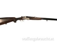 gebr. FERLACHER Bockbüchsflinte mit lg. Seitenplatten ohne ZF mit Schwenkmontage Ring 56 und SR, Zustand: Gut - Kal. 16/70