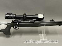Sauer 404 Synchro XT Kal: 243 win, LL 58 cm. Swarovski Z6i 2-12x50 SR. 