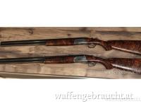 Rizzini Flintenpärchen 12/76 710m Lauflänge mit Wechselchocks und Doppellederfutteral 