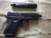 Glock 44 mit Gewindelauf und Schalldämpfer