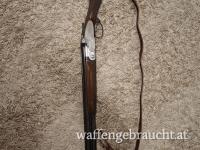 Beretta S2. 12/70 ,7 Pin Seitenschlossflinte H&H
